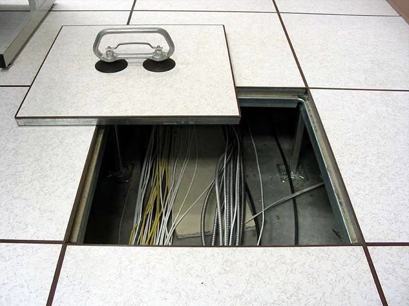 Cables under raised access floor systems